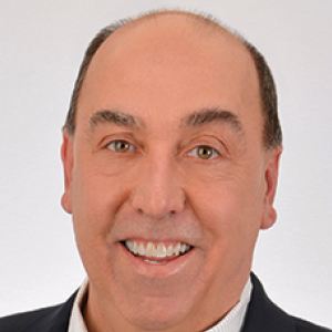 A headshot of John Hogan