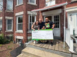 Grant recipient, Carlos with TruNorth Mortgage lender. 